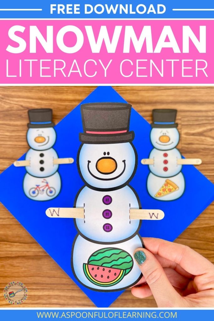 An example of 3 completed snowmen beginning sounds center activity. A popsicle stick that has a letter that matches the beginning sound of the picture on the snowman.