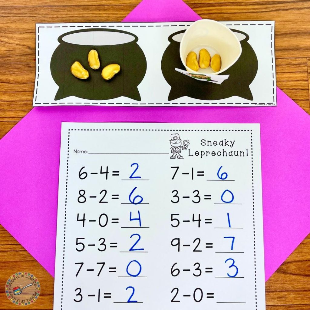 A hands-on math activity included in these St. Patrick's Day activities where students act out subtraction equations using gold beans to find the answer. They write the answer on the subtraction worksheet.