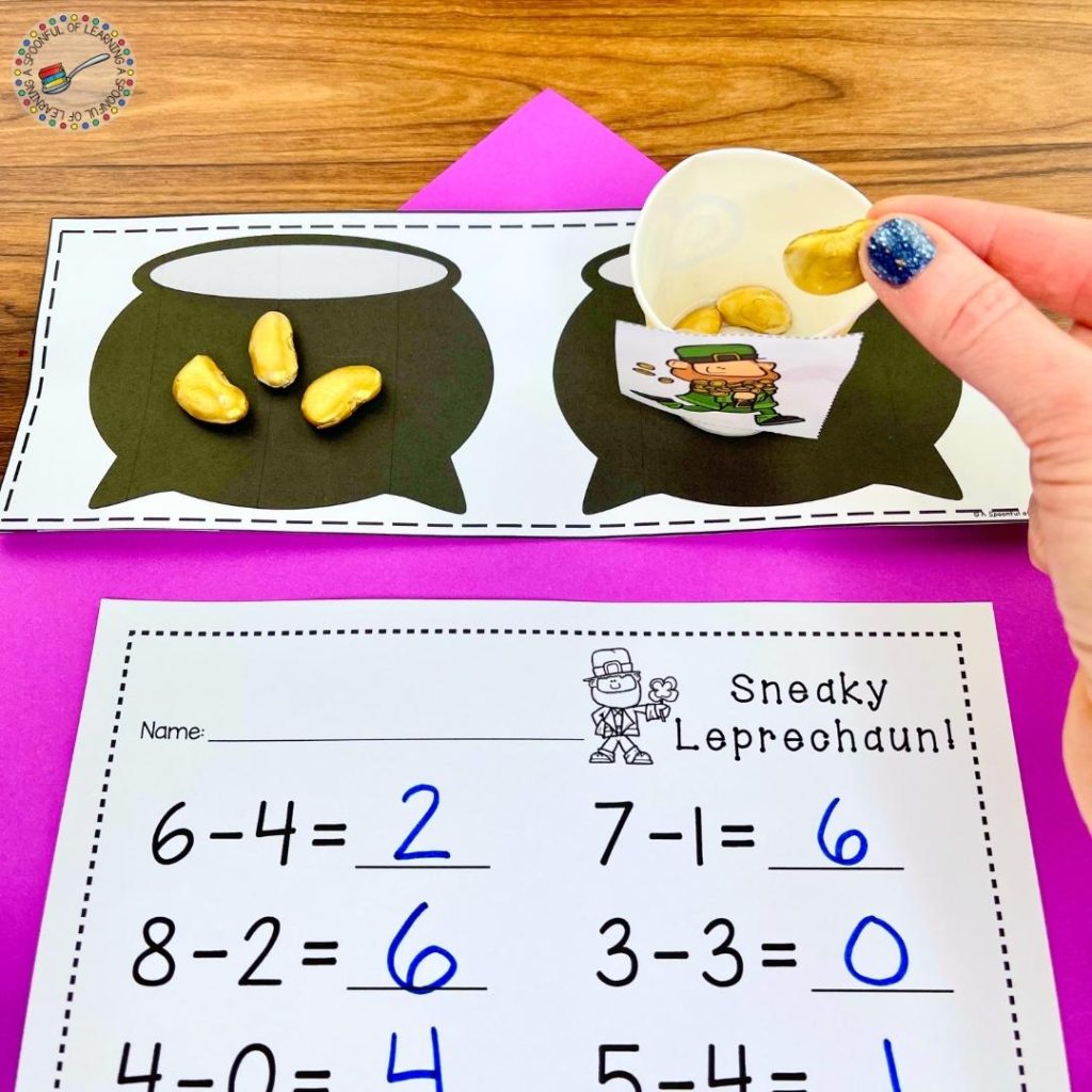 A St. Patrick's Day math activity where students act out subtraction equations using gold beans to find the answer.