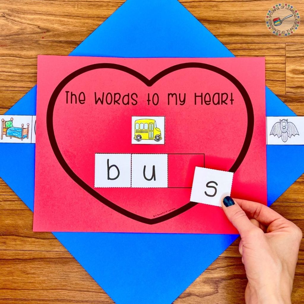 Use letters to build different CVC words for a hands-on Valentine's Day reading activity.