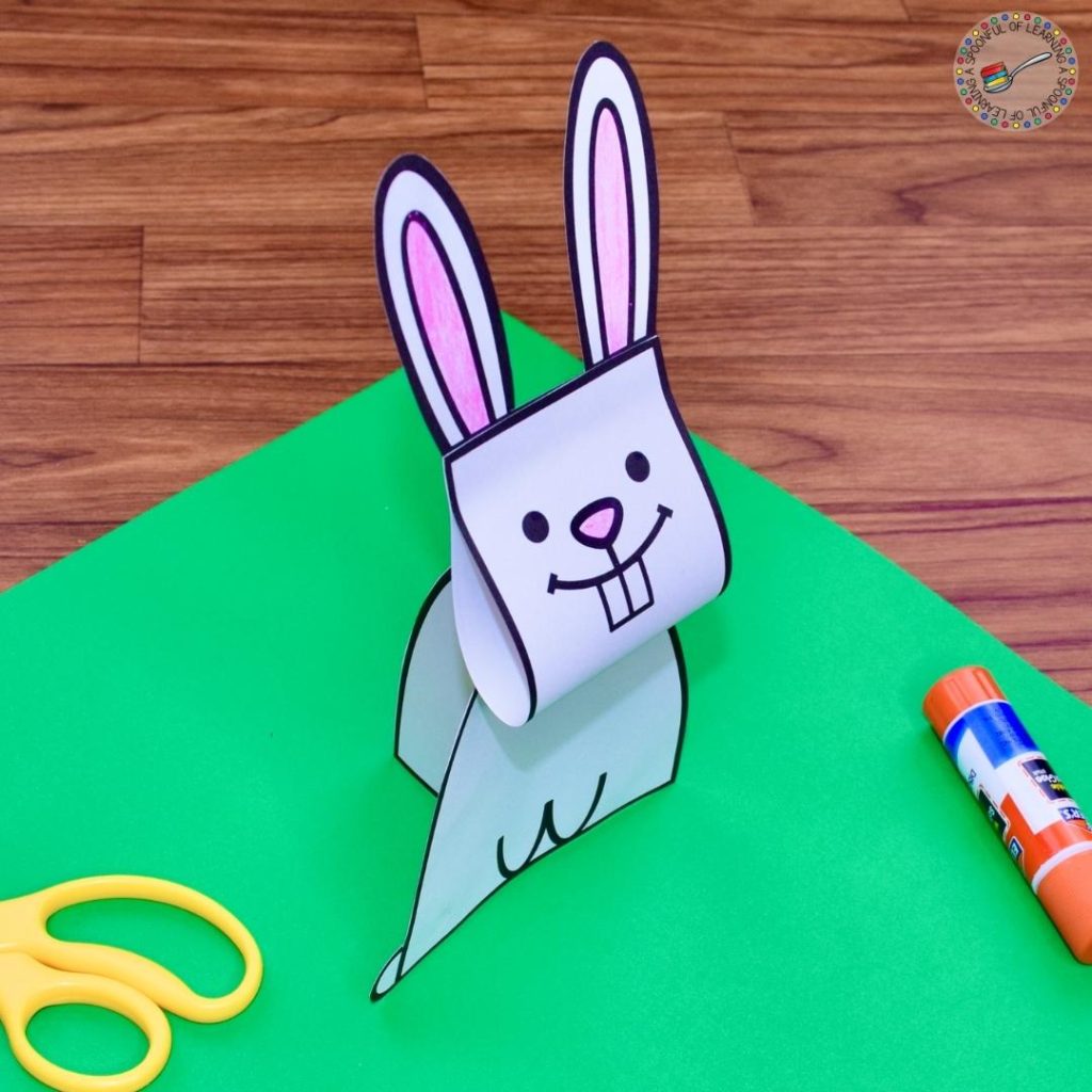 A free Easter craft that is made with paper, scissors, and a glue stick.