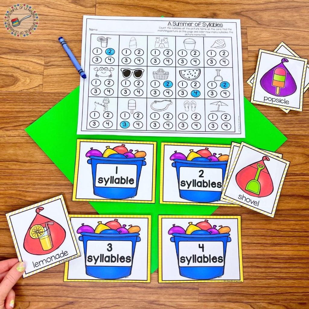 Syllable sorting activity with water balloon cards and a recording sheet.