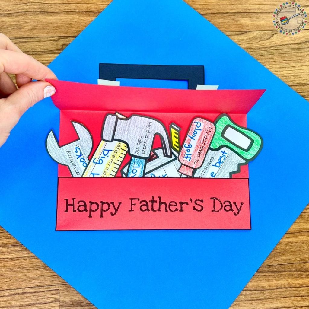 Happy Father's Day toolbox open, showing paper tools