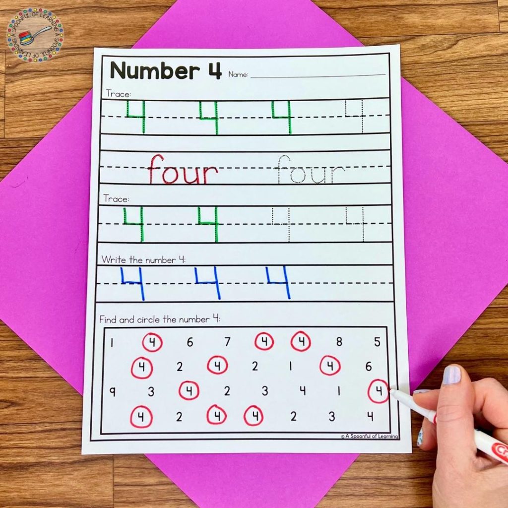 A trace, write, and find worksheet to practice the number four