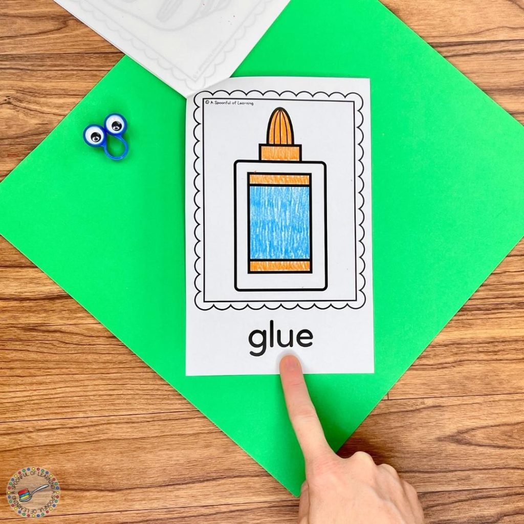 A completed page of a school mini reader showing glue
