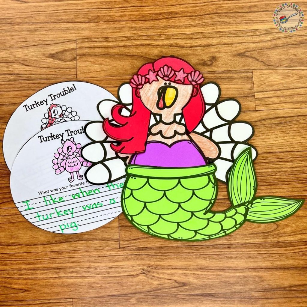 A turkey disguised as a mermaid, with writing pages.