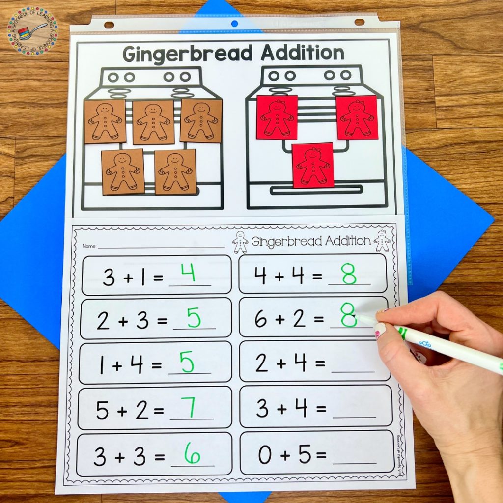 Gingerbread addition practice mat with equations on recording sheet
