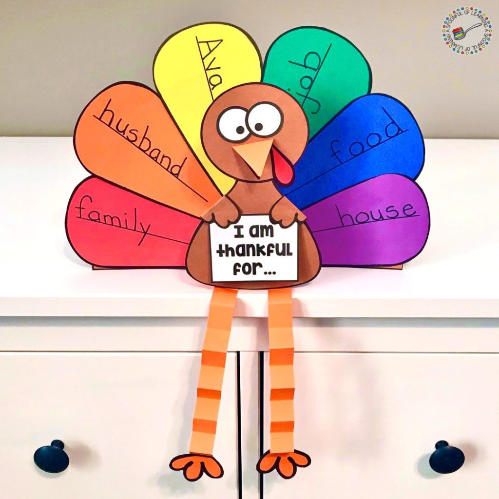 A turkey craft sitting on a dresser