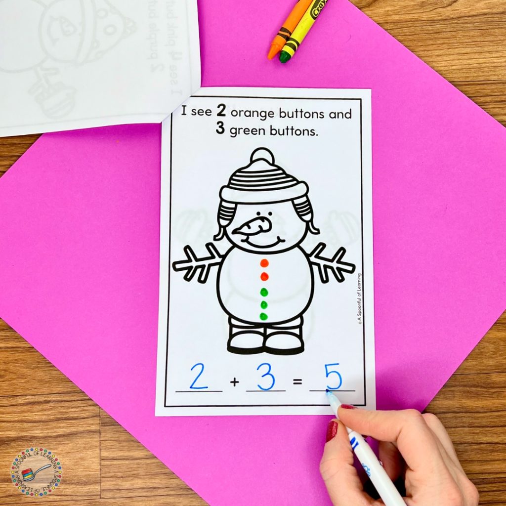 Drawing and counting snowman buttons in an addition mini reader