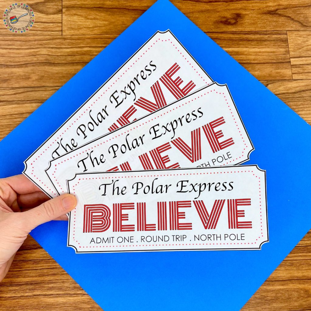 Holding three Polar Express tickets