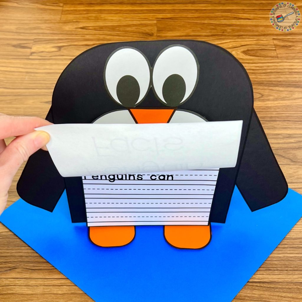 Lifting the cover of a penguin fact book craftivity