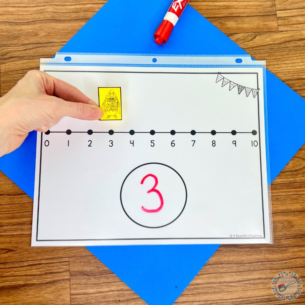 A number line mat with space to write a number