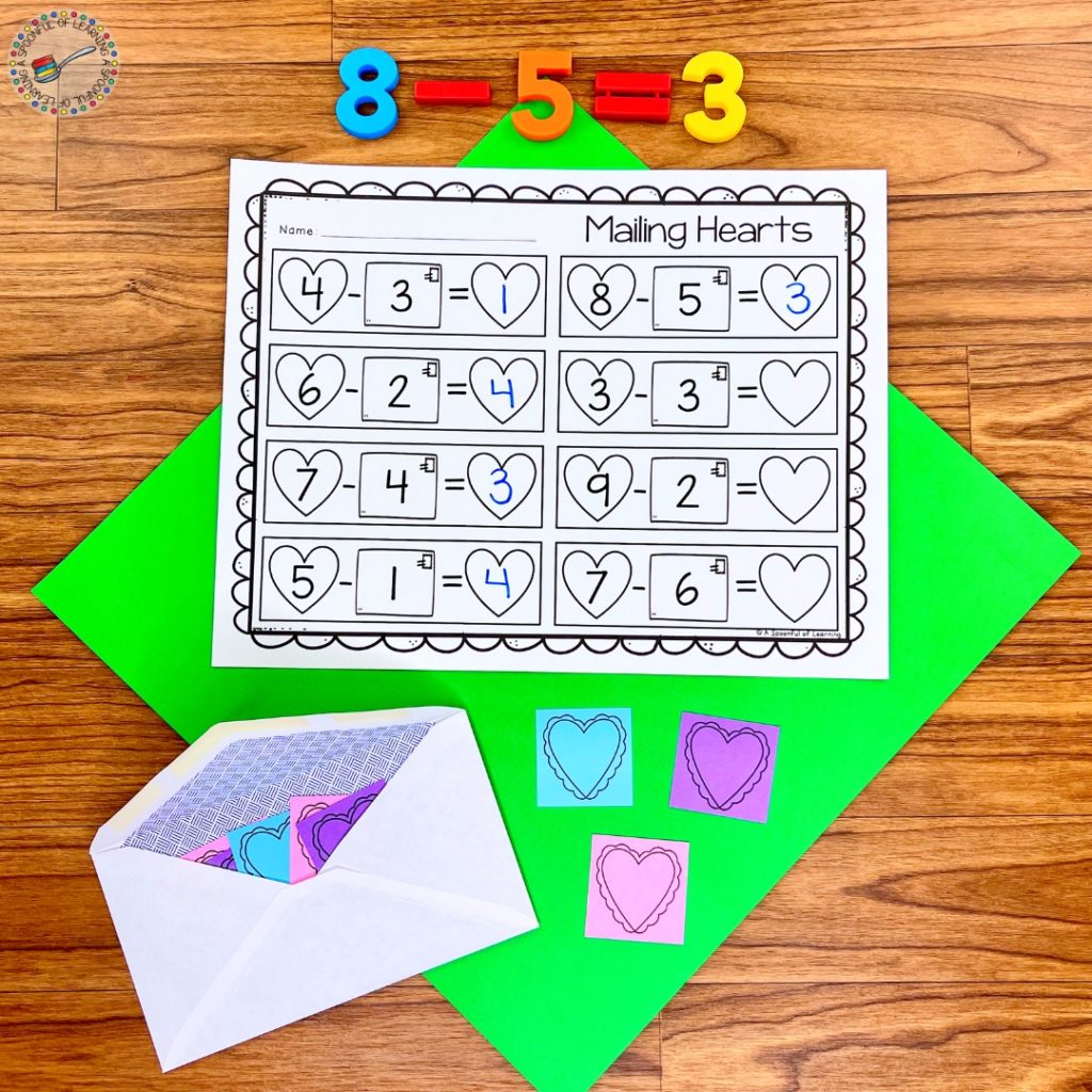 An interactive subtraction activity with heart-shaped paper counters