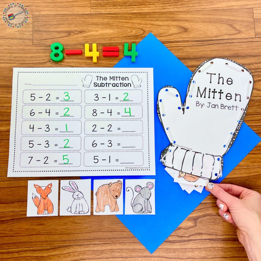 A subtraction worksheet and mitten lacing activity