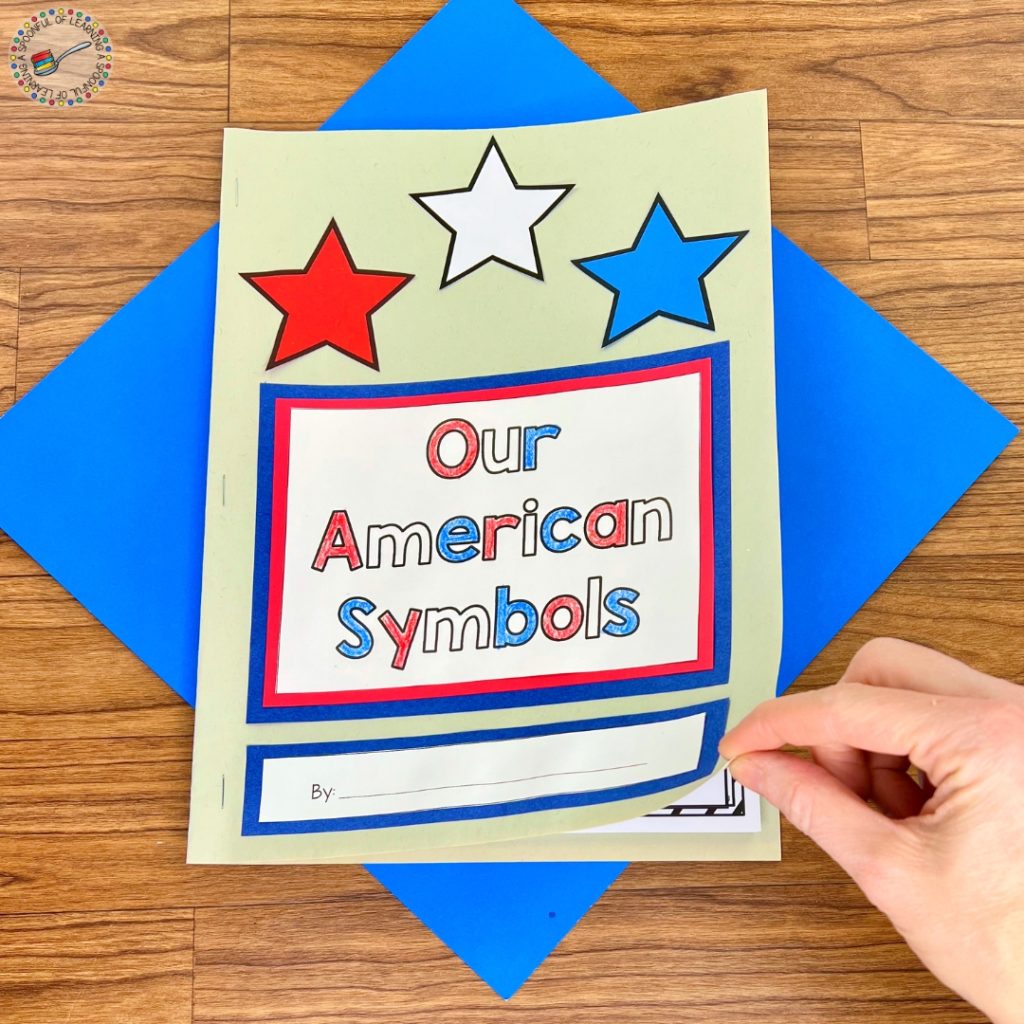 Opening the cover page of an "Our American Symbols" book