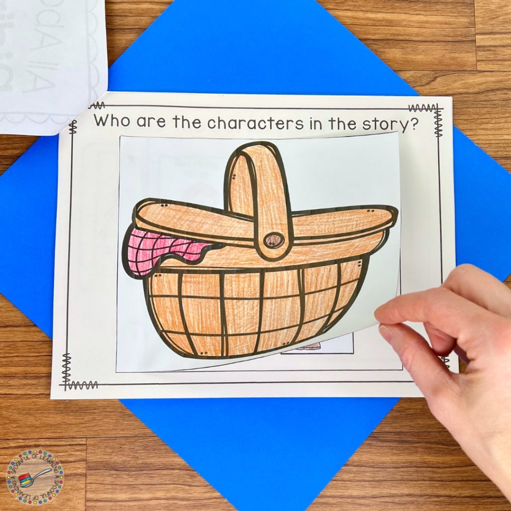 A large picnic basket flap covers the story characters