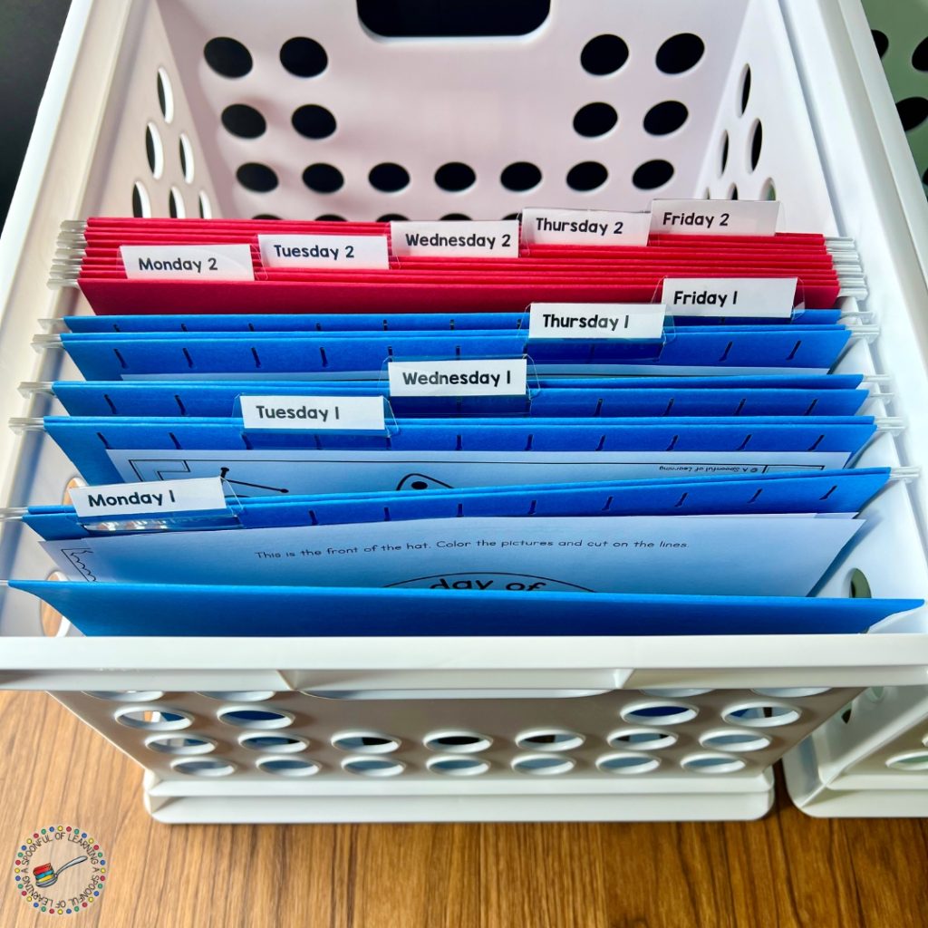 Blue folders with activities stored in each