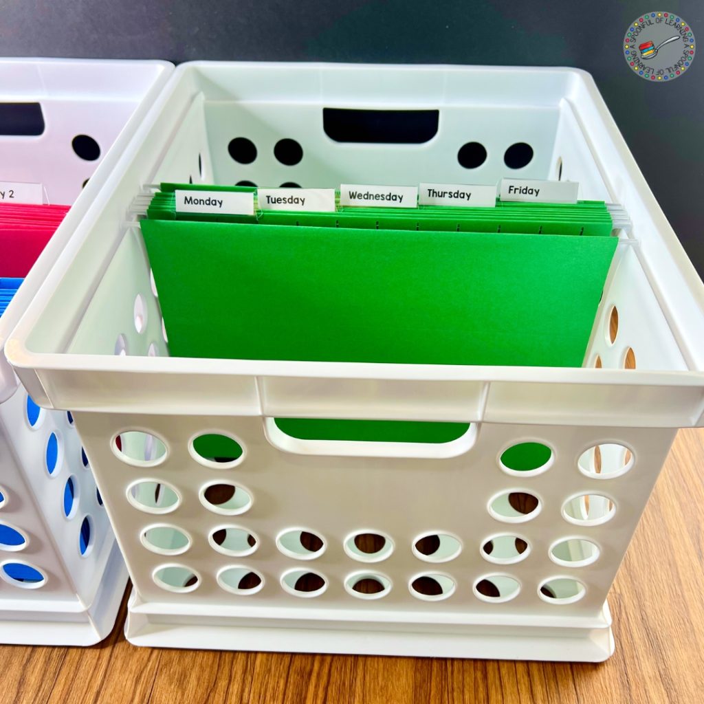 White crate with green folders