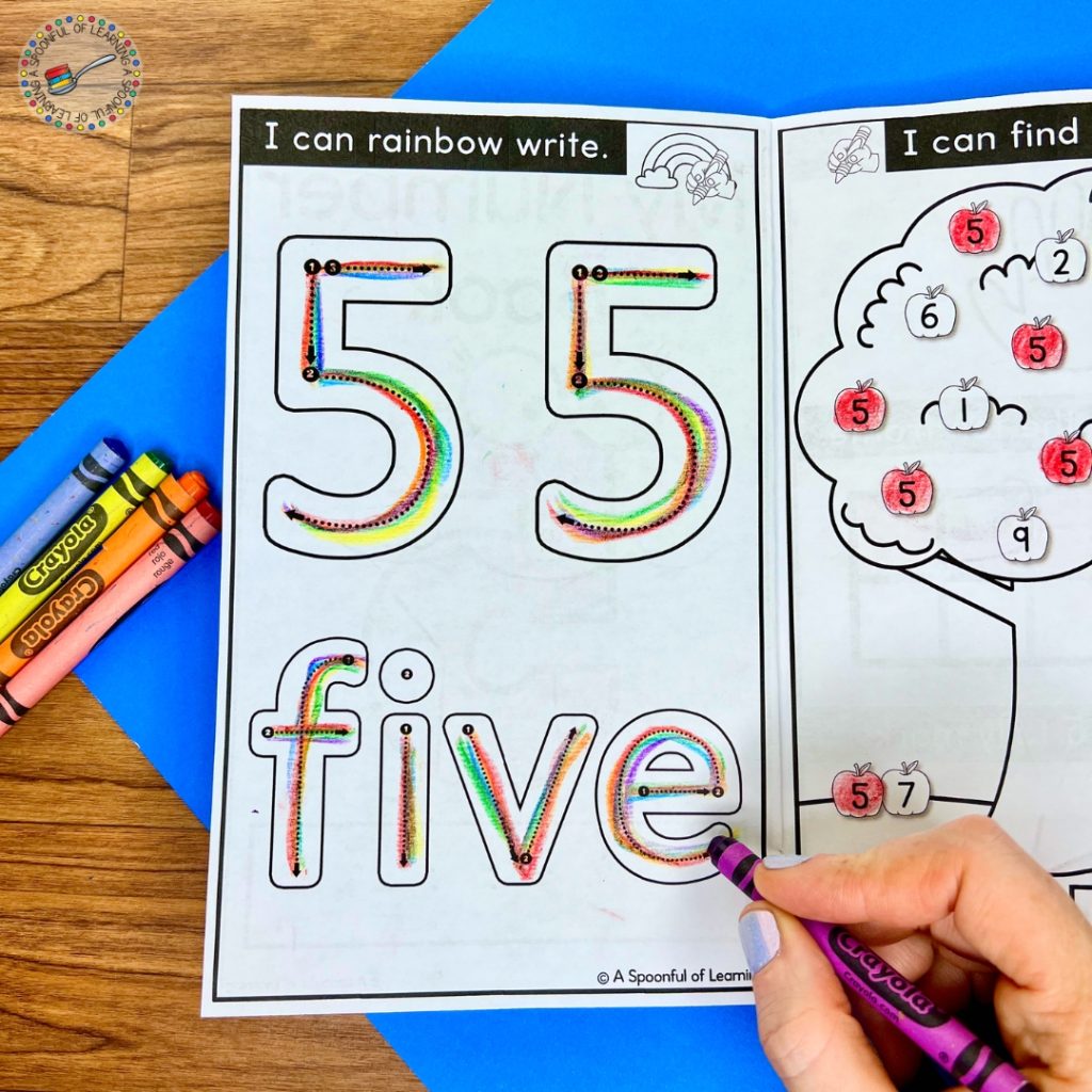 Rainbow writing the numeral and word for the number five
