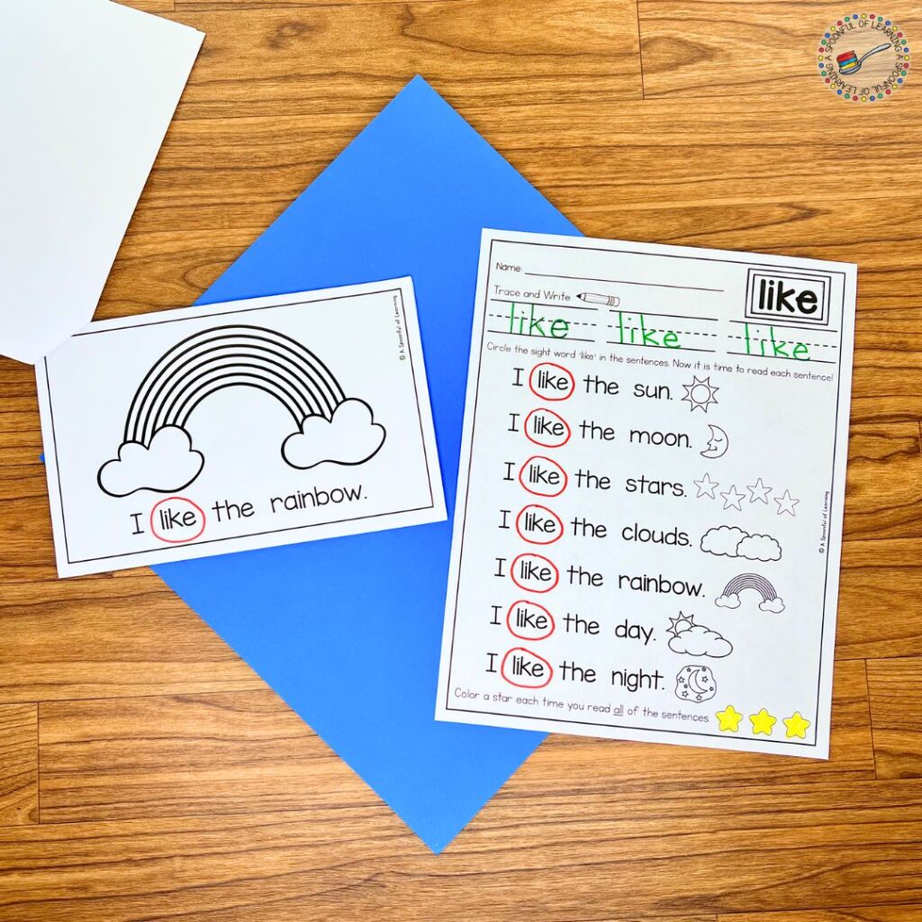 A sight word reader with a picture of a rainbow sits next to a fluency page.