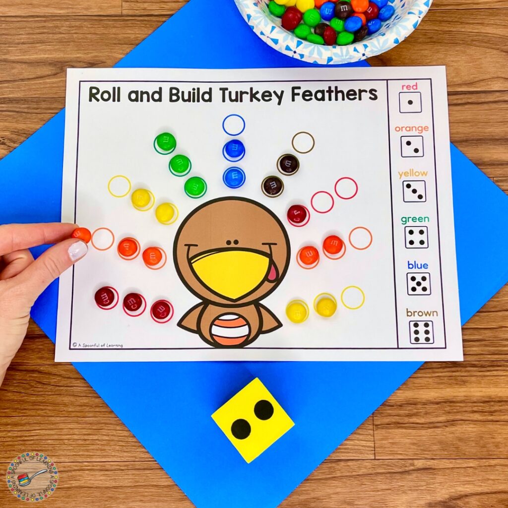 Adding candy to a turkey game mat