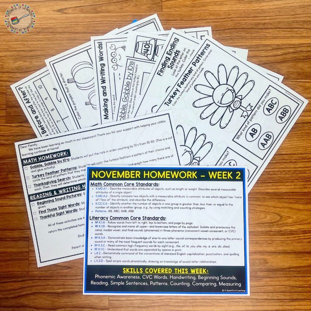 November homework printables fanned out on a table with an instruction sheet