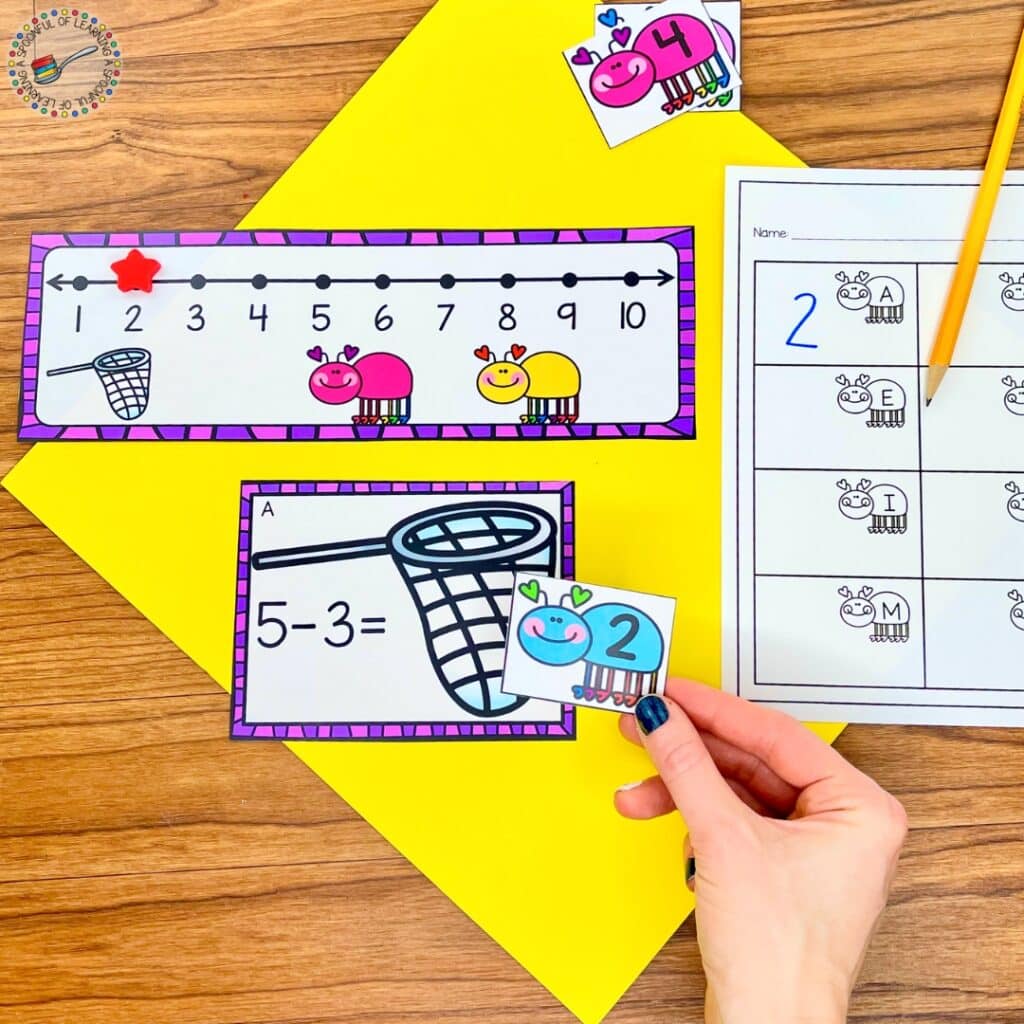 A love bug subtraction activity with task cards and a number line