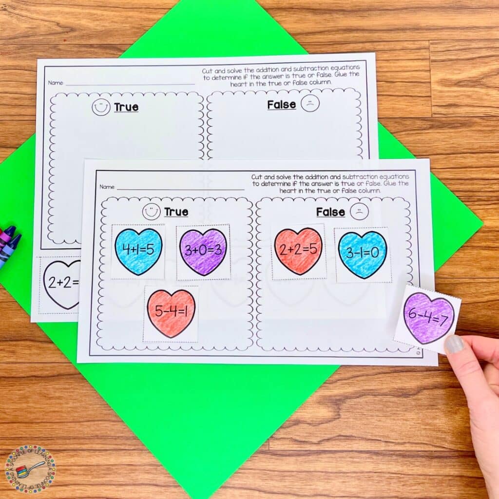 Sorting hearts into True or False columns based on math sentences